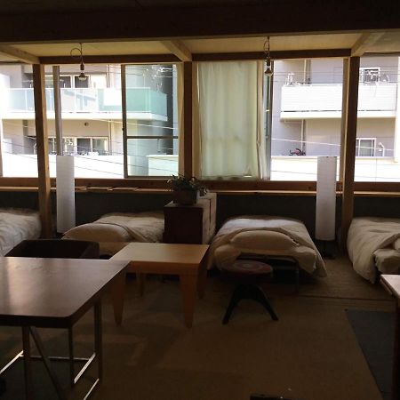 Hotel Sunshine/三舎院 Ōsaka Extérieur photo